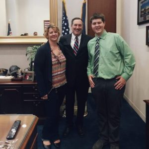 Jackson Bell and his mother with former Senator Joe Donaly 